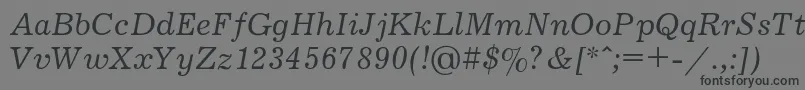 JournalItalic Font – Black Fonts on Gray Background