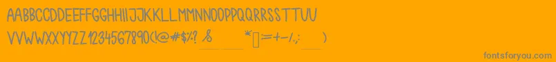 フォントChokoshtroko – オレンジの背景に灰色の文字