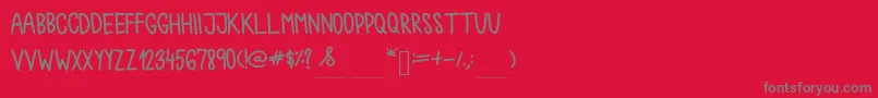 フォントChokoshtroko – 赤い背景に灰色の文字