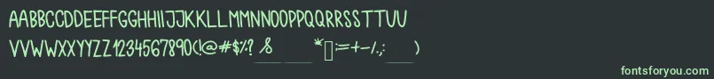 Chokoshtroko Font – Green Fonts on Black Background