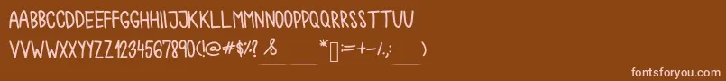 Chokoshtroko Font – Pink Fonts on Brown Background