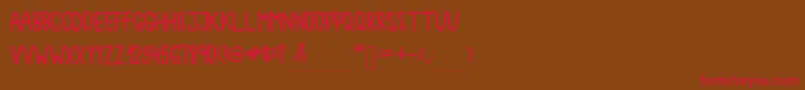 Chokoshtroko Font – Red Fonts on Brown Background