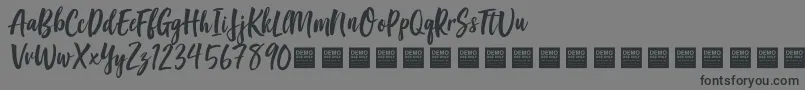 Шрифт GoodVibesDemo – чёрные шрифты на сером фоне