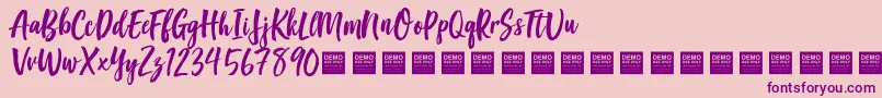 Czcionka GoodVibesDemo – fioletowe czcionki na różowym tle