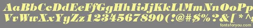 TringlandHeavyItalic-fontti – keltaiset fontit harmaalla taustalla