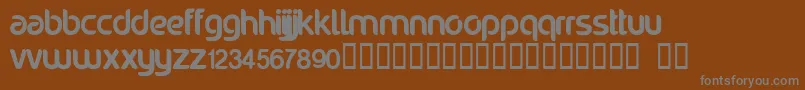 Noraviyel-fontti – harmaat kirjasimet ruskealla taustalla