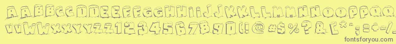 SnapsTasteChristmas-Schriftart – Graue Schriften auf gelbem Hintergrund