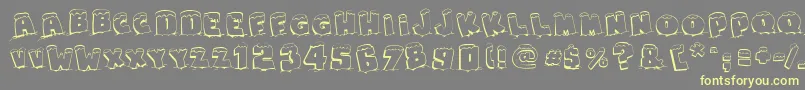 SnapsTasteChristmas Font – Yellow Fonts on Gray Background