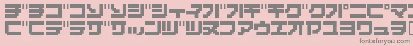 フォントMassiv – ピンクの背景に灰色の文字