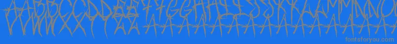 Więcej informacji o czcionce Brushofanarchyoutline Czcionka Brushofanarchyoutline – szare czcionki na niebieskim tle