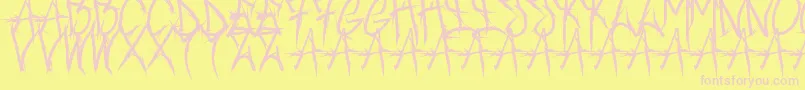 Brushofanarchyoutline-fontti – vaaleanpunaiset fontit keltaisella taustalla