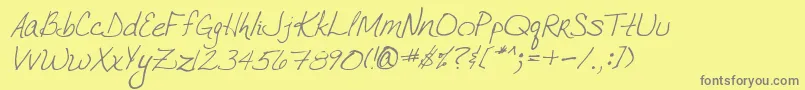 VtcJoelenehandRegularItalic Font – Gray Fonts on Yellow Background