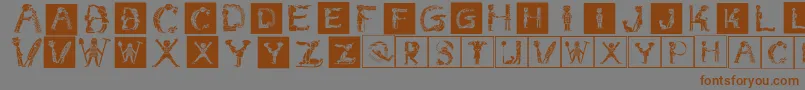 フォントChildrensalphabetinvers – 茶色の文字が灰色の背景にあります。