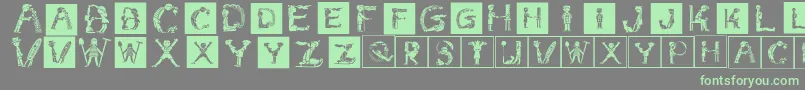 Childrensalphabetinvers Font – Green Fonts on Gray Background