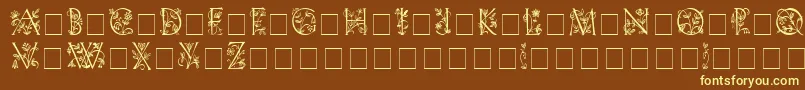 FleurdisplaycapsssiMedium-fontti – keltaiset fontit ruskealla taustalla
