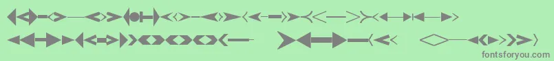 Czcionka CreativearrowsLtOne – szare czcionki na zielonym tle