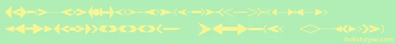 フォントCreativearrowsLtOne – 黄色の文字が緑の背景にあります