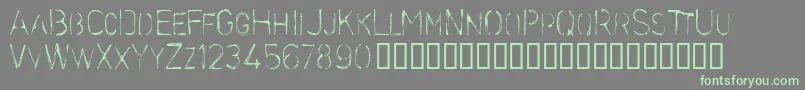 Stencilc Font – Green Fonts on Gray Background