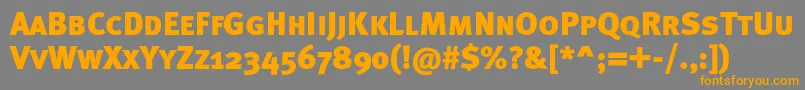 Metablackcapsc Font – Orange Fonts on Gray Background