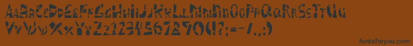 Schizm-fontti – mustat fontit ruskealla taustalla