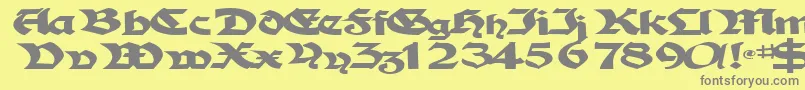 フォントTampicosskBold – 黄色の背景に灰色の文字