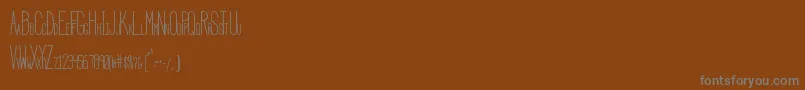 フォントHbmSerenityCondensed – 茶色の背景に灰色の文字