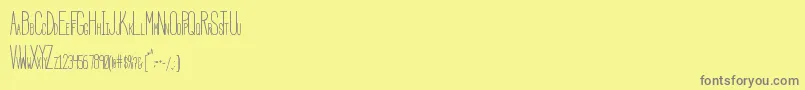 HbmSerenityCondensed Font – Gray Fonts on Yellow Background