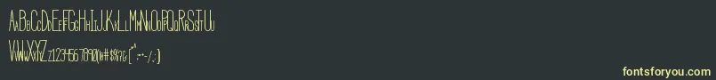 HbmSerenityCondensed-Schriftart – Gelbe Schriften auf schwarzem Hintergrund