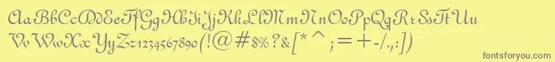 フォントFrench111Bt – 黄色の背景に灰色の文字