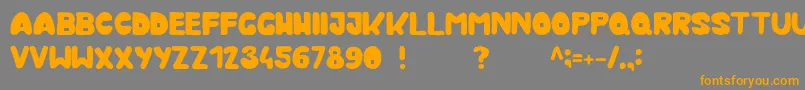 Kmurka Font – Orange Fonts on Gray Background