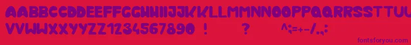 Kmurka Font – Purple Fonts on Red Background