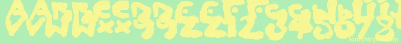 ChildlikeBlobs Font – Yellow Fonts on Green Background