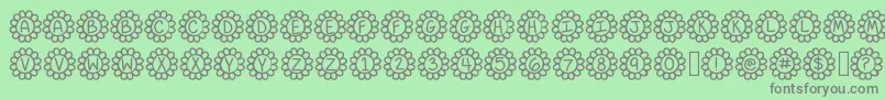 Flower Power-Schriftart – Graue Schriften auf grünem Hintergrund