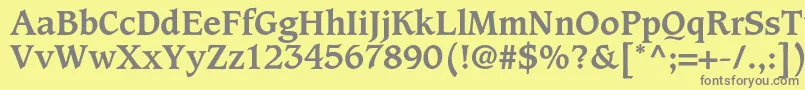 フォントCaxtonstdBold – 黄色の背景に灰色の文字