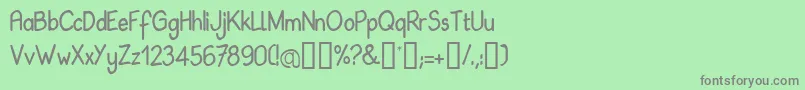 フォントBabil – 緑の背景に灰色の文字