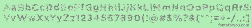 PabellonaCTriplex-Schriftart – Graue Schriften auf grünem Hintergrund