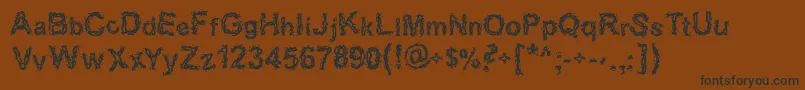 Halebopp Font – Black Fonts on Brown Background