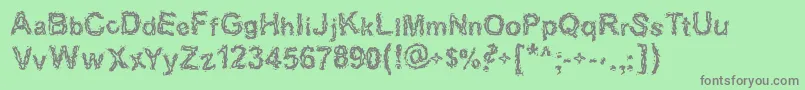Halebopp-Schriftart – Graue Schriften auf grünem Hintergrund