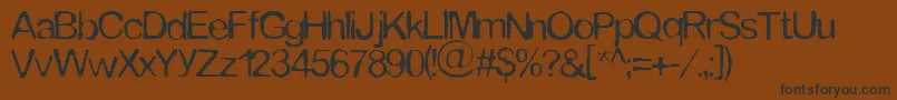Tommytxtey Font – Black Fonts on Brown Background