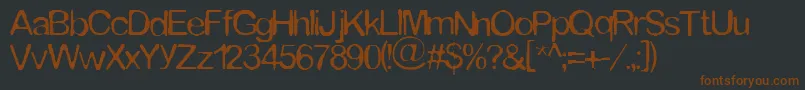 Tommytxtey Font – Brown Fonts on Black Background