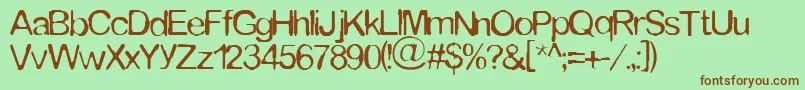 Tommytxtey Font – Brown Fonts on Green Background