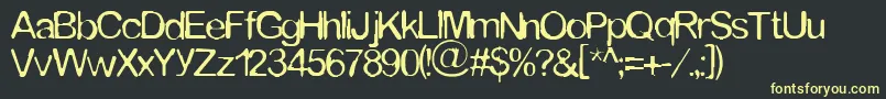 Tommytxtey Font – Yellow Fonts on Black Background