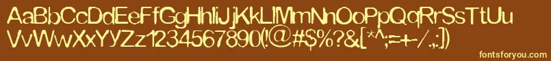 Tommytxtey Font – Yellow Fonts on Brown Background