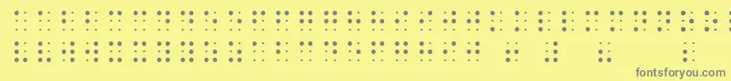 フォントSheetsBraille – 黄色の背景に灰色の文字