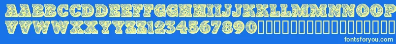 Paisleycaps ffy Font – Yellow Fonts on Blue Background