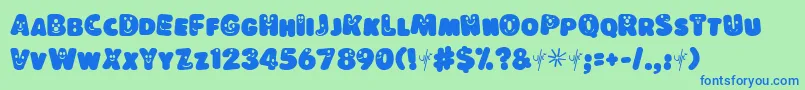 LokinderschriftDunkel-fontti – siniset fontit vihreällä taustalla
