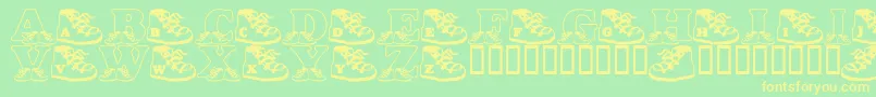 フォントLmsBabyHaydensShoes – 黄色の文字が緑の背景にあります