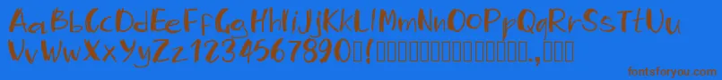 Pwmambo Font – Brown Fonts on Blue Background