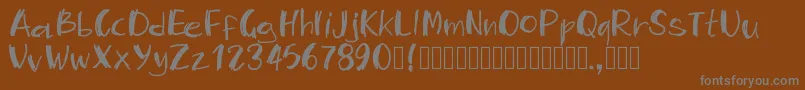 More about Pwmambo Font Pwmambo Font – Gray Fonts on Brown Background