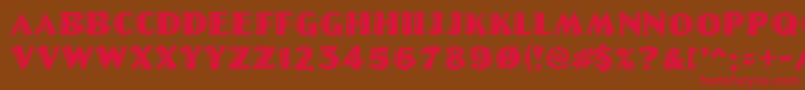 フォントLinolschrift – 赤い文字が茶色の背景にあります。